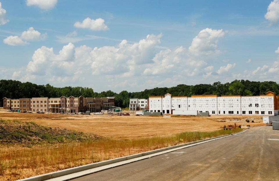 <strong>Overall, Phase 1 of Lakeland Town Square will include 138 flats and 21,200 square feet of commercial, as well as amenities like a clubhouse and pool for residents. The first building, including the leasing office, workout facility and 26 apartments, should be complete July 1.</strong> (Mark Weber/The Daily Memphian)