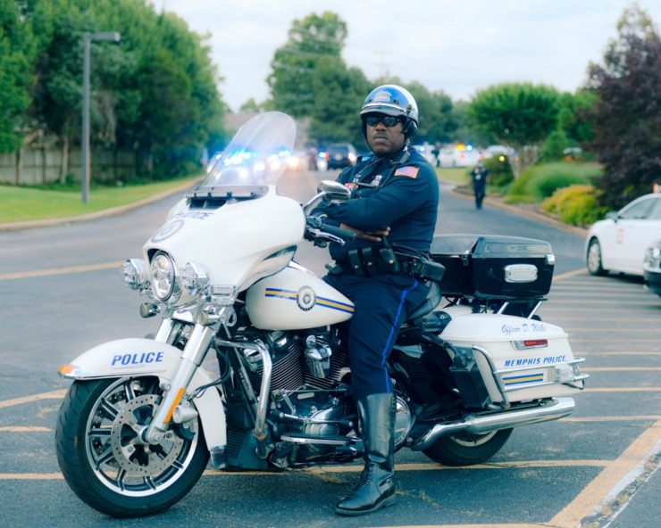 <strong>Officer Derrick Wilks, a friend of Officer Scotty Triplett, leads the motorcade of officers in the Sea of Blue ceremony out of Hope Presbyterian Church. Officer Christopher Scott &ldquo;Scotty&rdquo; Triplett was killed last week after he was struck by a car while riding his motorcycle in a motorcade near Hickory Hill.</strong> (Houston Cofield/Special To The Daily Memphian)