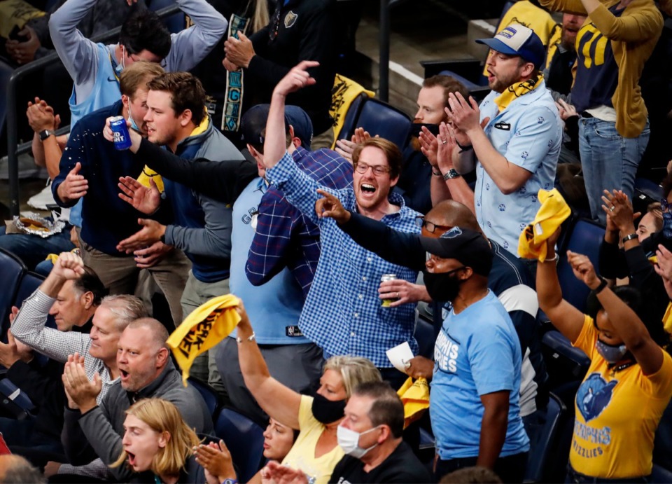 <strong>Memphis Grizzlies fans celebrate during action against the Utah Jazz in game three of the NBA Playoffs on Saturday, May 29, 2021.</strong> (Mark Weber/The Daily Memphian)