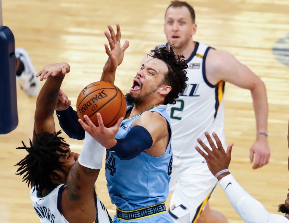 <strong>Memphis Grizzlies forward Dillion Brooks (middle) drives for a lay-up against the Utah Jazz defense during game three of the NBA Playoffs on Saturday, May 29, 2021.</strong> (Mark Weber/The Daily Memphian)