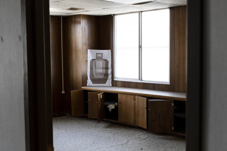 <strong>The Shelby County SWAT team has used the 100 North Main Building for training. The floor is littered with simulation cartridges, and the walls have posters with target images.</strong> (Brad Vest/Special to the Daily Memphian)