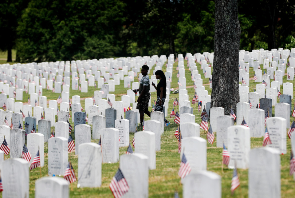 <strong>Family and friends visit loved ones on Memorial Day at the West Tennessee Veterans Cemetery on Monday, May 31, 2021.</strong> (Mark Weber/The Daily Memphian)