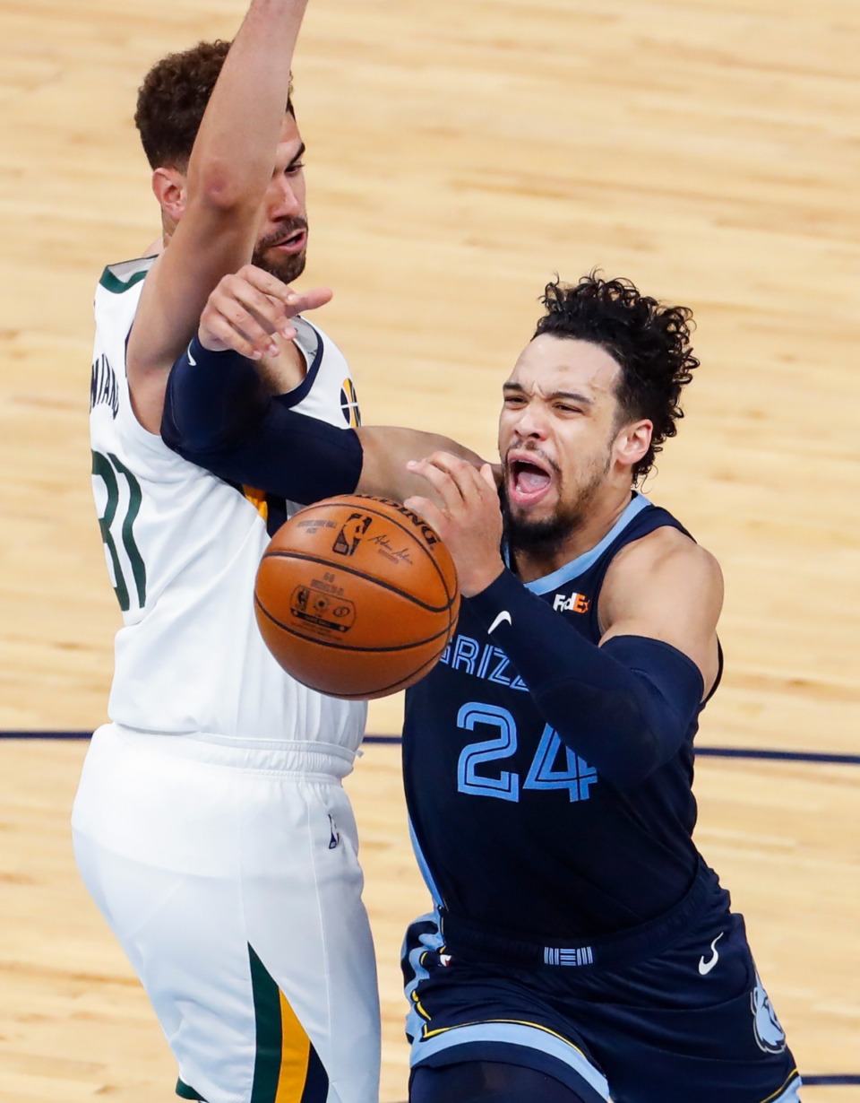 <strong>Memphis Grizzlies guard Dillon Brooks (right) drives the lane against Utah Jazz defender Georges Niang (left) during action of game four of the NBA playoffs on Monday, May 31, 2021</strong>. (Mark Weber/The Daily Memphian)