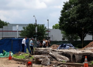 <strong>Members of the Memphis Greenspace board take a look at the now former grave of Nathan Forrest in Memphis, Tennessee June 11, 2021.</strong> (Patrick Lantrip/Daily Memphian)