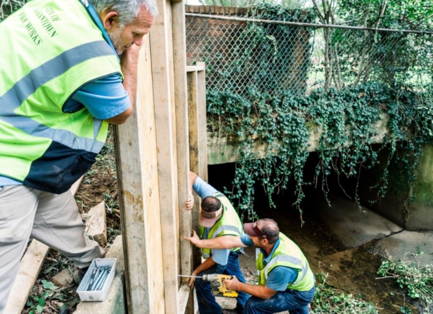 <strong>Crews make repairs to the Miller Farms ditch during the summer of 2019. In recent years, several emergency repairs have been made to the aging ditch.&nbsp;</strong>(Houston Cofield/Special to the Daily Memphian file)