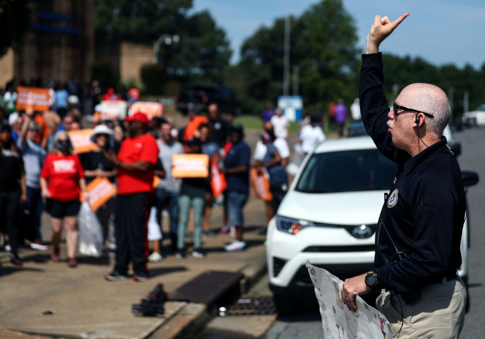 <strong>Memphis Police Department deputy chief Don Crowe counts down to the beginning of the fourth Unity Walk Against Gun Violence at Hamilton High School June 12, 2021.</strong> (Patrick Lantrip/Daily Memphian)