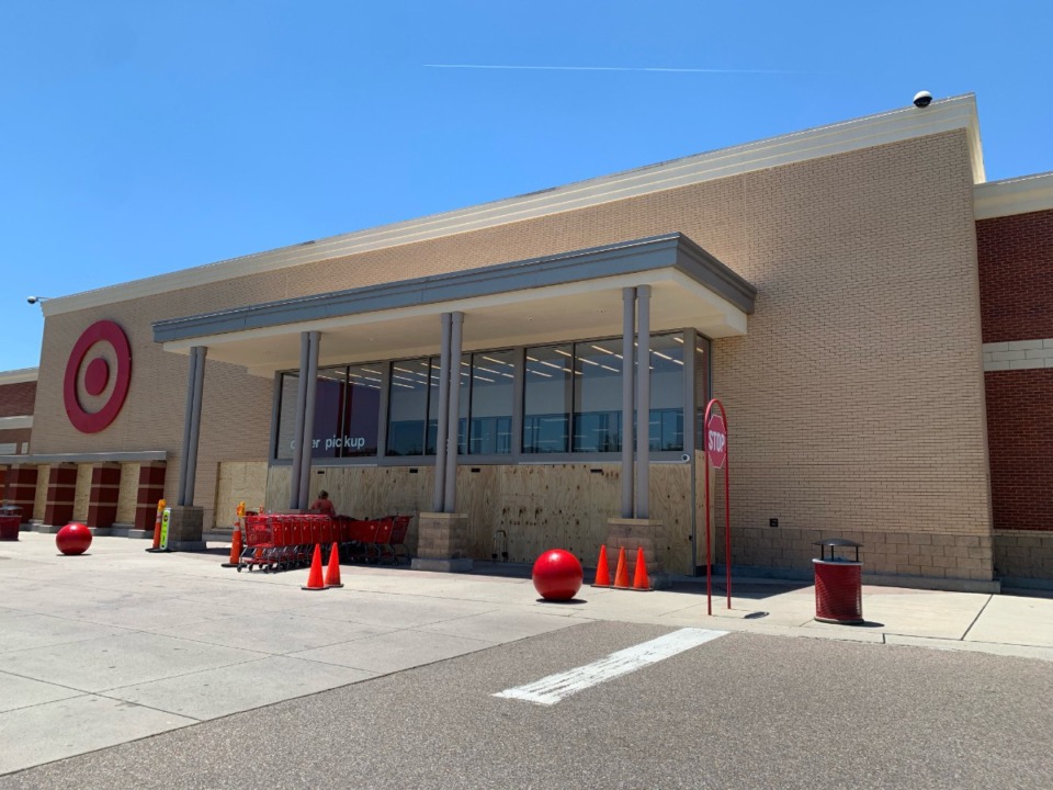 <strong>The entrance to the Target in Collierville is boarded up after a fire in the store Saturday. A reopening date has not been set.</strong> (Abigail Warren/Daily Memphian)