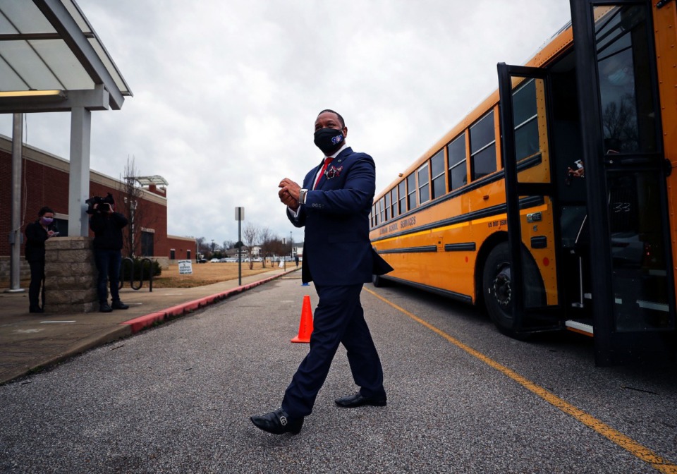 <strong>Shelby County Schools Superintendent Joris Ray exits a yellow school bus outside of Riverwood Elementary March 1, 2021.</strong> (Patrick Lantrip/Daily Memphian file)
