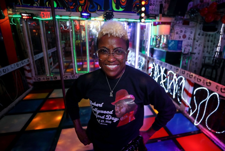 <strong>Paula Raiford poses stands on the dance floor of Paula &amp; Raiford's Disco, her popular Downtown Memphis late night mainstay.</strong> (Patrick Lantrip/Daily Memphian)