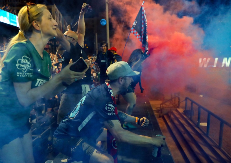 <strong>Memphis 901 FC fans celebrate a home opener win over Atlanta United 2 in Autozone Park on June 16.</strong> (Patrick Lantrip/Daily Memphian)