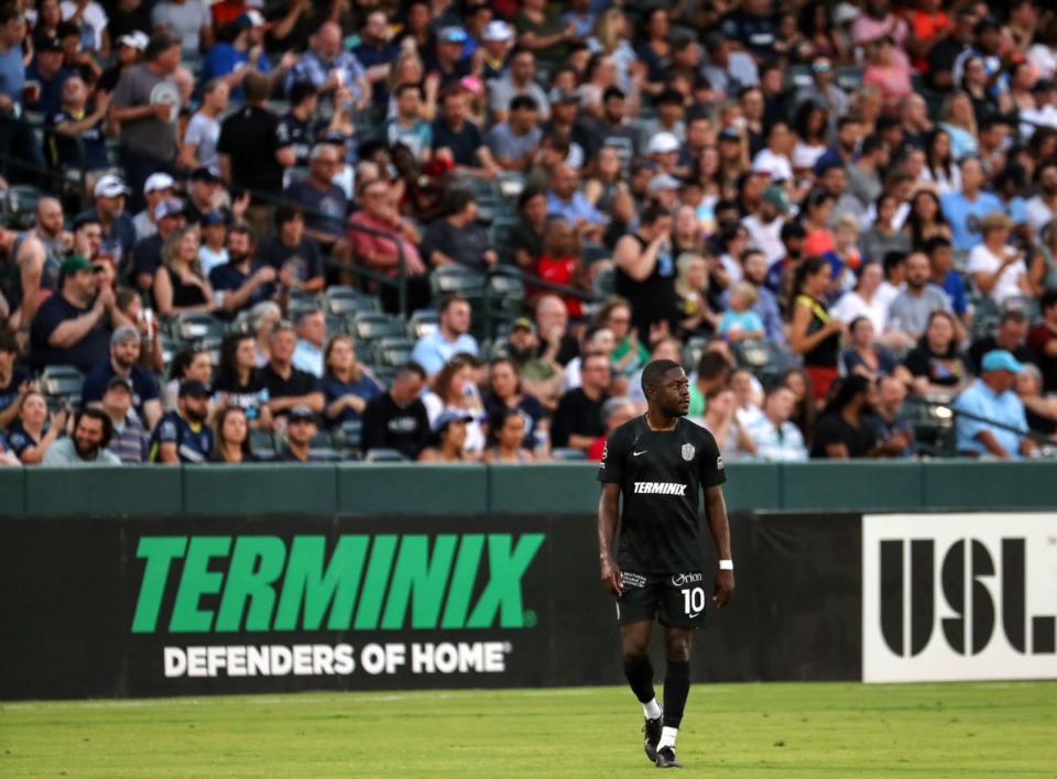 <strong>Memphis 901 FC midfilder Kadeem Dacres (10) plays in front of the first packed house in over a year during the team's home opener against Atlanta United 2 June 16, 2021.</strong> (Patrick Lantrip/Daily Memphian)
