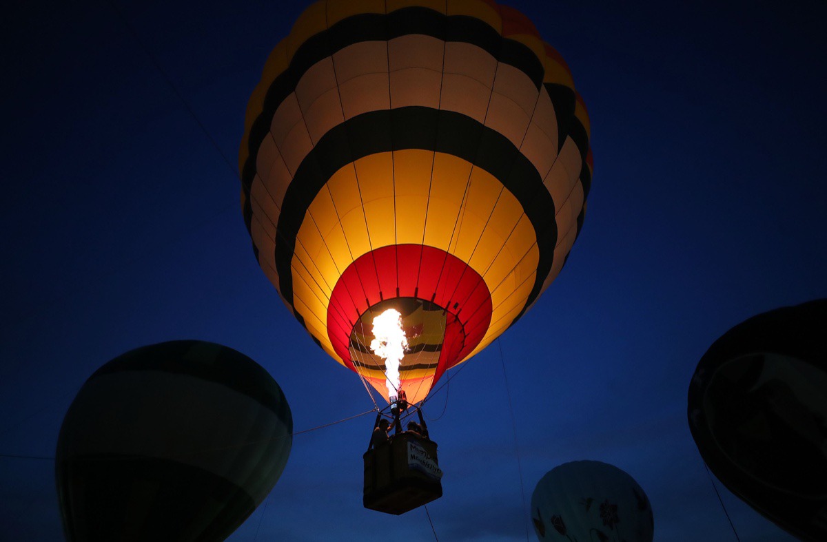 <strong>A lone hot air balloon takes off during the first day of the Bluff City Balloon Jamboree in Collierville on June 18, 2021.</strong> (Patrick Lantrip/Daily Memphian)