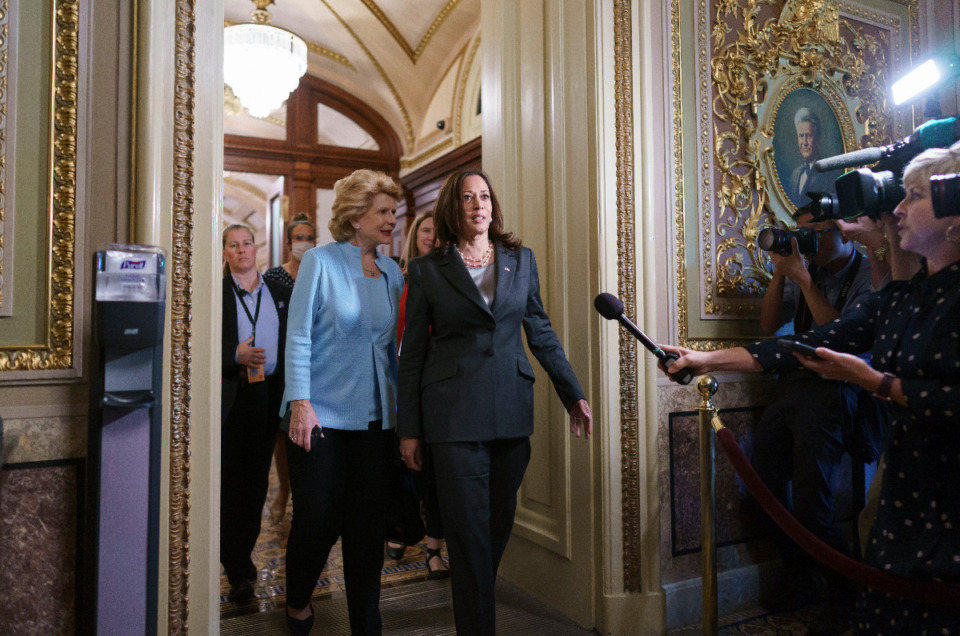 <strong>Vice President Kamala Harris, joined at left by Sen. Debbie Stabenow, D-Mich., leaves the Senate chamber following the procedural vote on the For the People Act, a sweeping bill that would overhaul the election system and voting rights, at the Capitol in Washington, Tuesday, June 22, 2021. The motion to proceed to debate failed.</strong> (AP Photo/J. Scott Applewhite)