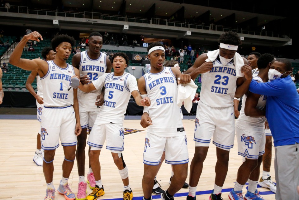 <strong>University of Memphis Tigers Jayden Hardaway (1), Mousse Cisse (32), Boogie Ellis (5), Landers Nolley (3) and Malcolm Dandridge (23) celebrate winning the NIT basketball tournament March 28, 2021.</strong> (courtesy NCAA)