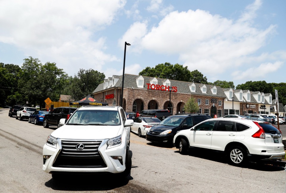 <strong>Traffic backs up at the new Torchy&rsquo;s restaurant in the Williamsburg Village shopping center on Friday, June 25.</strong>&nbsp;<strong>The strip center on Mendenhall near Poplar has been a commercial property since 1964.</strong> (Mark Weber/Daily Memphian)
