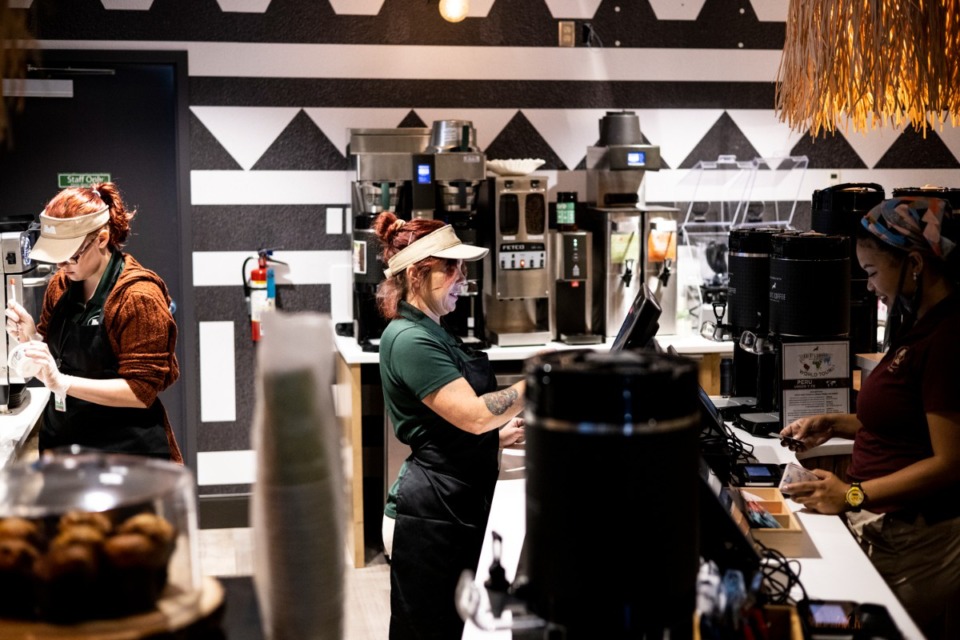 <strong>Rebecca Turner, center, takes a customer&rsquo;s order at Ancient Grounds, the Memphis Zoo&rsquo;s new coffee shop, located near the entrance to the zoo.</strong>&nbsp;(Brad Vest / Special to The Daily Memphian)&nbsp;
