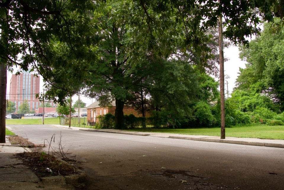 <strong>One of the pocket development sites lines the west side of Ashland (right), within walking distance and sight of Le Bonheur Children&rsquo;s Hospital (background).</strong> (Tom Bailey/Daily Memphian)