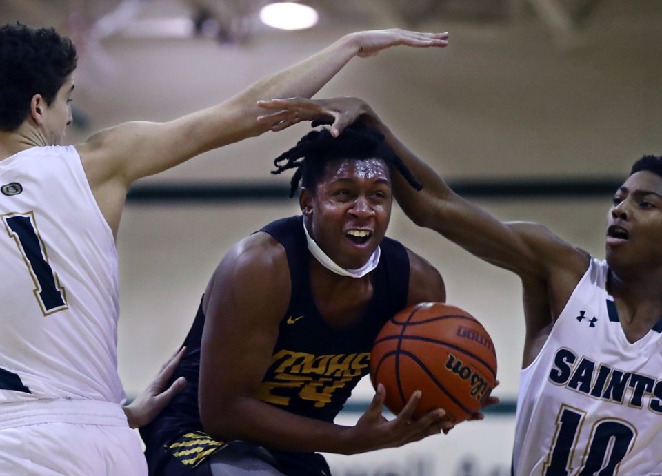 <strong>An all-around athlete who also plays basketball, Memphis Academy of Health Sciences guard Cameron Miller (24) has committed to play football at UT-Knoxville.&nbsp;</strong>(Patrick Lantrip/Daily Memphian file)