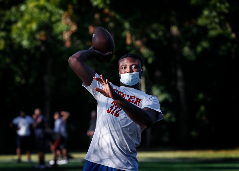 <strong>PURE Youth Academy quarterback Tevin Carter takes part in practice on Monday, Oct. 5, 2020 in Whitehaven. </strong>(Mark Weber/The Daily Memphian file)