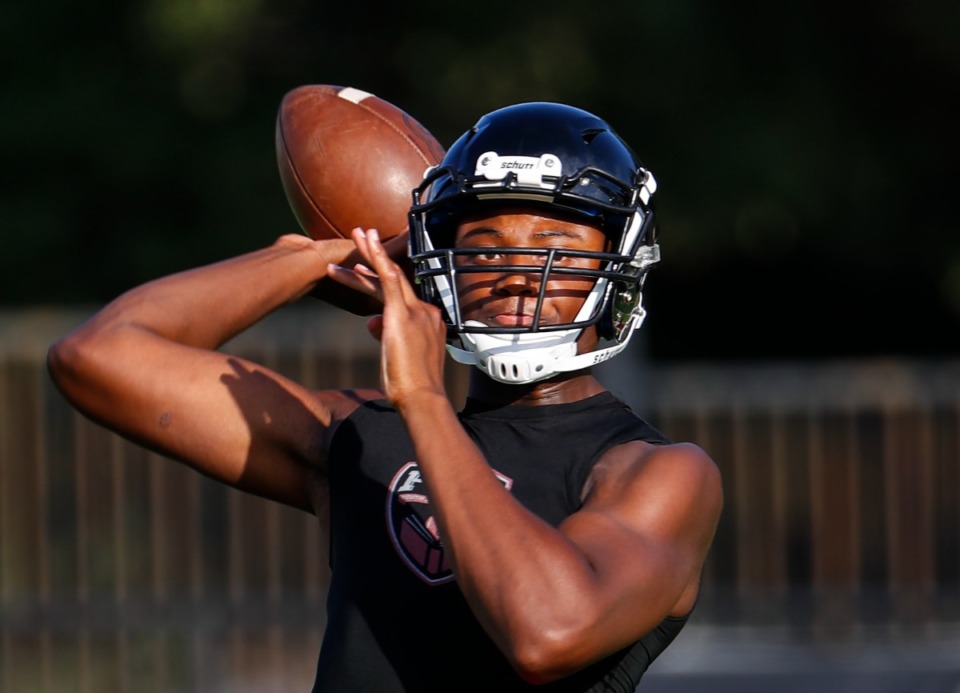 <strong>PURE Youth quarterback Tevin Carter passes during a 7-on-7 game against ECS on Thursday, July 15, 2021.</strong> (Mark Weber/The Daily Memphian file)