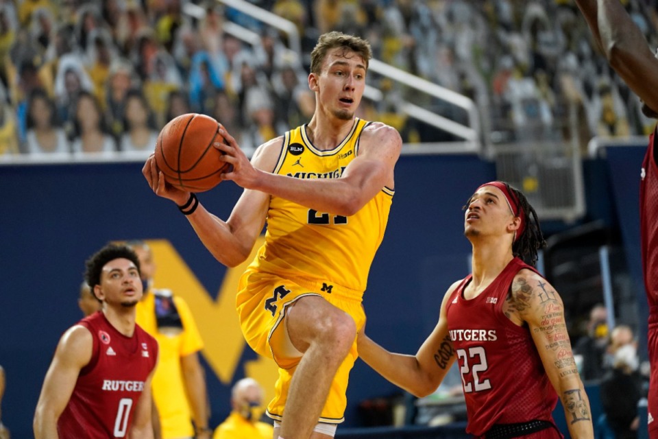 <strong>Jonathan Givony says that the buzz is that the Grizzlies are most interested in Michigan forward Franz Wagner (center) and Australian wing/guard Josh Giddey (not pictured), with the former unlikely to be there at No. 10.</strong> (AP Photo/Paul Sancya, File)