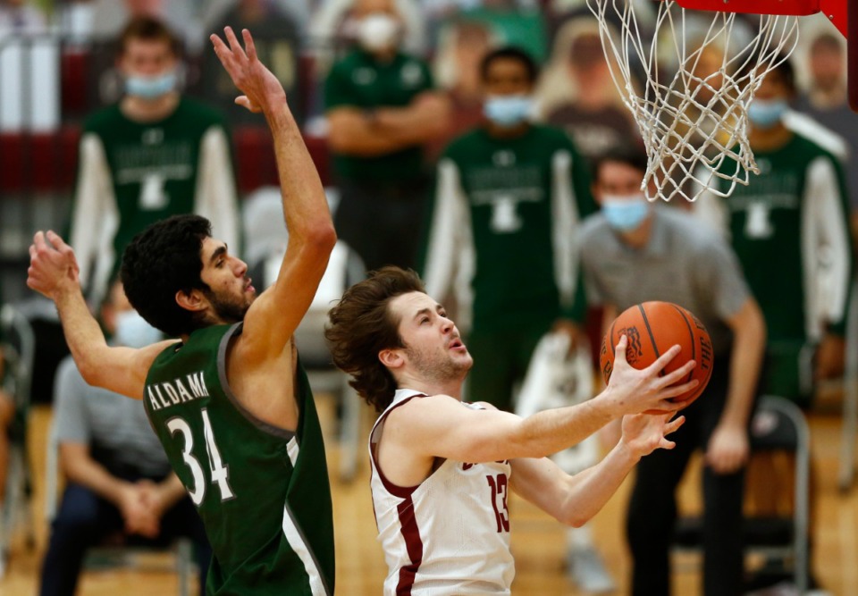 <strong>Santi Aldama (34), trying to block a shot during the finals of the Patriot League tournament, Sunday, March 14, 2021, in Hamilton, N.Y., will be a great fit for Memphis, said his former Loyola coach.</strong> (John Munson/AP file)