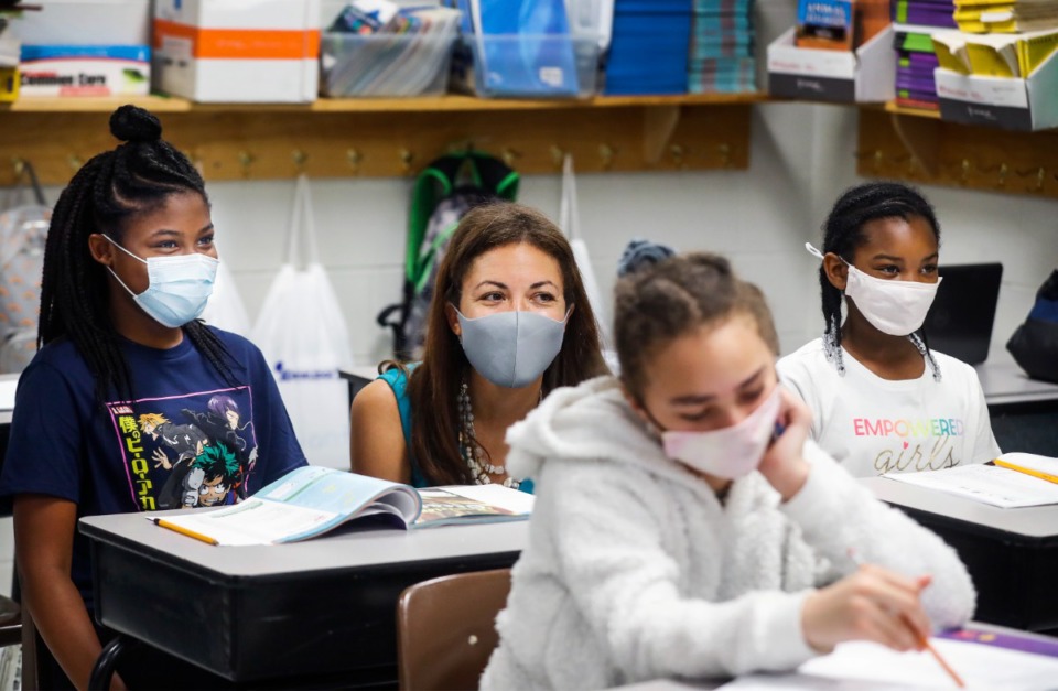 <strong>Tennessee Department of Education Commissioner Penny Schwinn (middle) and students at Lowrance K-8 all wear masks on Monday, July 26, 2021.</strong> (Mark Weber/The Daily Memphian file)