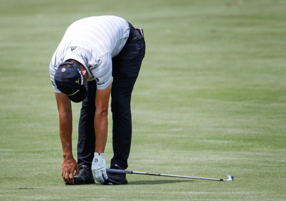 <strong>PGA golfer Collin Morikawa bends over after hitting his 10th hole fairway shot into the rough&nbsp;during the first round of the WGC-FedEx St. Jude Invitational on Thursday, Aug. 5, 2021, at TPC Southwind.</strong> (Mark Weber/The Daily Memphian)