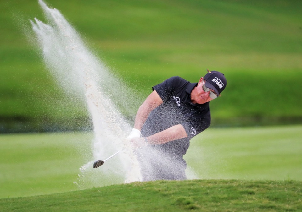 <strong>Phil Mickelson blasts out of a bunker on the third hole during the final round of last year&rsquo;s WGC-FedEx St. Jude Invitational on Aug. 2, 2020</strong>.&nbsp;<strong>He scored four birdies on his first four holes in the second round of this year&rsquo;s tournament on Friday, Aug. 6, 2021.</strong> (Patrick Lantrip/Daily Memphian file)