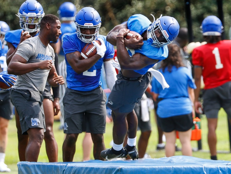<strong>Memphis running back Marquavius Weaver grips the ball during first day of practice on Friday, Aug. 6, 2021.</strong> (Mark Weber/The Daily Memphian)