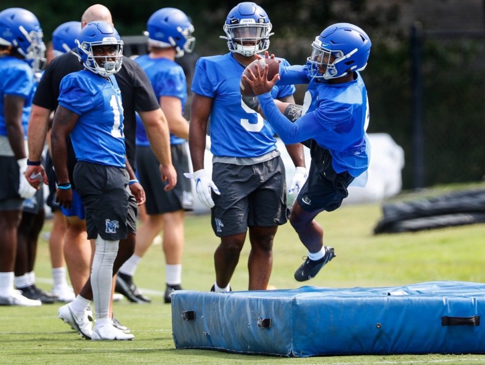<strong>Memphis receiver Calvin Austin III makes a catch during first day of practice on Friday, Aug. 6, 2021.</strong> (Mark Weber/The Daily Memphian)