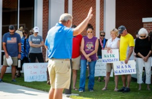 <strong>Protesters gather outside Collierville Schools&rsquo; administration building on Monday, Aug. 9, to show their opposition to the Shelby County Health Department&rsquo;s mandate for universal masking in schools.</strong> (Mark Weber/Daily Memphian)