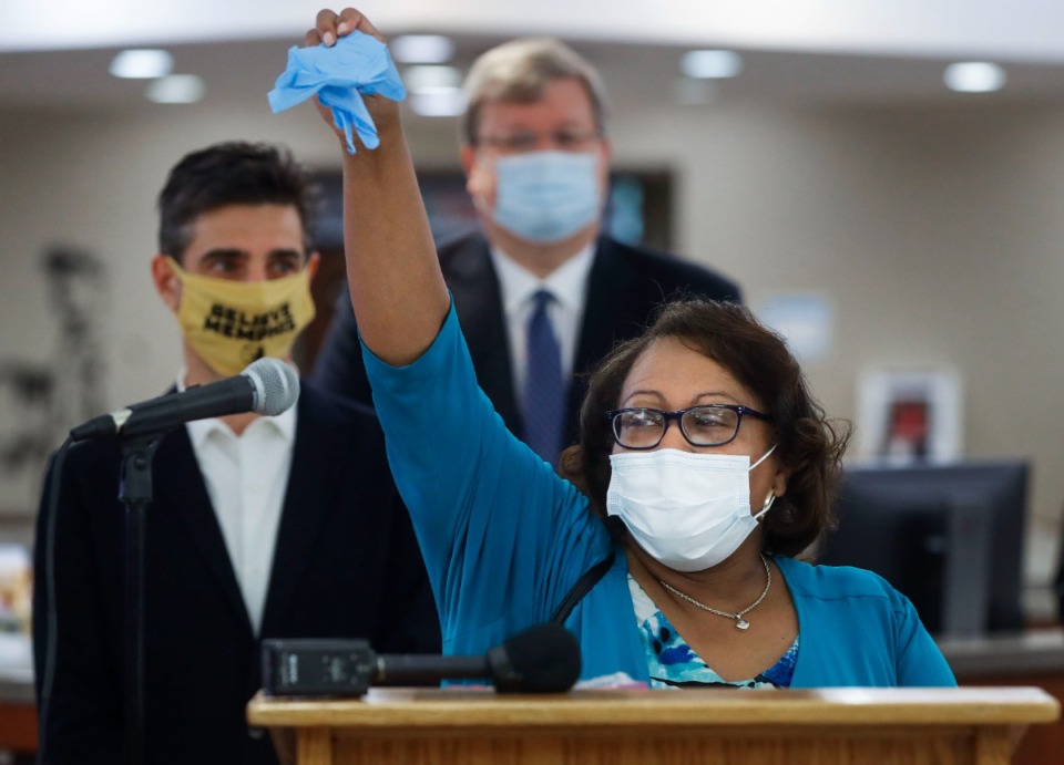 <strong>Memphis City Councilwomen Patrice Robinson holds up plastic glove during a press conference announcing the City's Mask Up Memphis campaign on Monday, June 22, 2020 at Whitehaven Branch Library.</strong> (Mark Weber/Daily Memphian file)