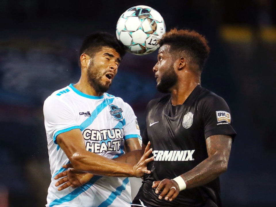<strong>Memphis 901 FC forward Michael Salazar (right) goes up for a header against a Colorado Springs defender during a home match Tuesday, Aug. 10, at AutoZone Park.</strong> (Patrick Lantrip/Daily Memphian)
