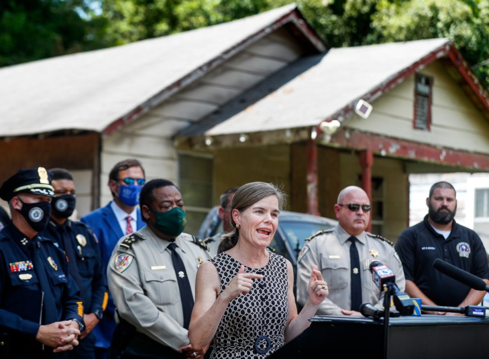 <strong>Shelby County District Attorney Amy Weirich speaks during a press conference on Wednesday, Aug. 11, in front of three houses in North Memphis that were closed as public nuisances due to drug sales.</strong> (Mark Weber/Daily Memphian)