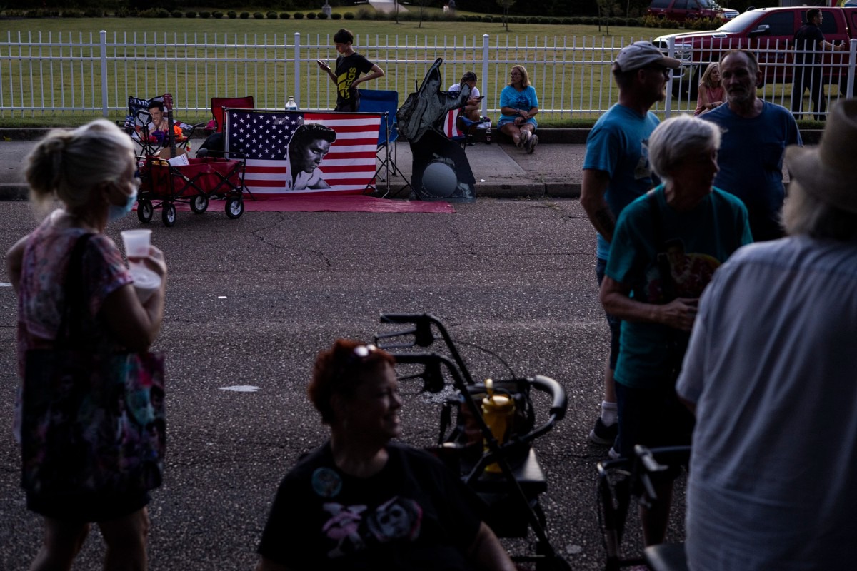 <strong>Fans gather along Elvis Presley Boulevard during the Elvis Week 2021 Candlelight Vigil outside Graceland.</strong> (Brad Vest/Special to The Daily Memphian)