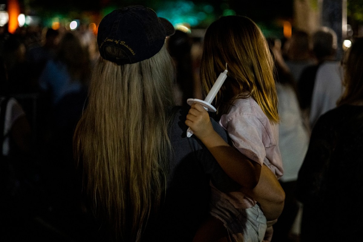 <strong>Fans of all ages gather Sunday, Aug. 15, 2021 outside Graceland along Elvis Presley Boulevard during the Elvis Week 2021 Candlelight Vigil. The vigil marks the anniversary of the singer&rsquo;s death on Aug. 16, 1977.</strong> (Brad Vest/Special to The Daily Memphian)