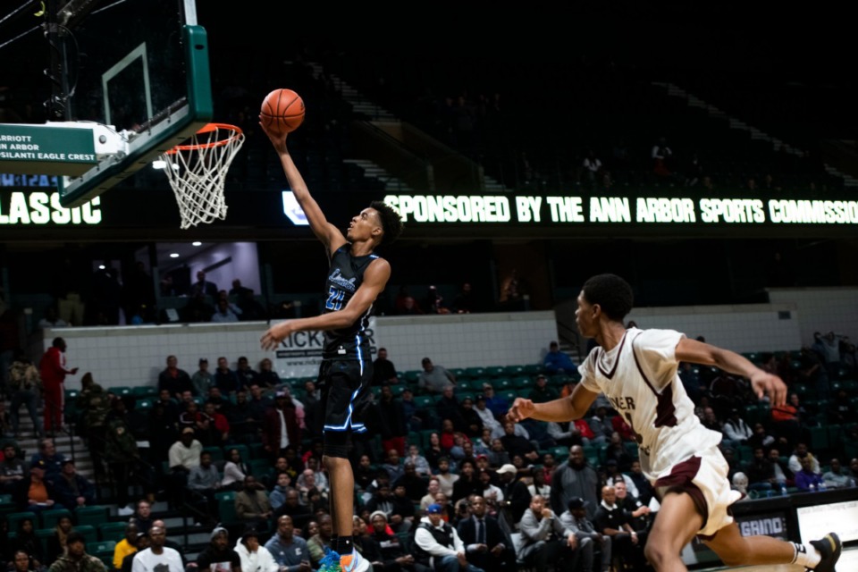 <strong>&nbsp;In this Dec. 9, 2019, file photo, Emoni Bates shoots against River Rouge during the Tip Off Classic high school basketball game in Ypsilanti, Michigan.</strong> <strong>Bates will be taking an official visit to Memphis, according to college basketball insider Jeff Goodman.</strong> (Nicole Hester/Ann Arbor News via AP, File)
