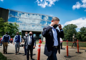 <strong>Tennessee Gov. Bill Lee takes off his face mask after touring the emergency hospital at 495 Union in Memphis in 2020, a facility that ended up not being used.</strong> (Mark Weber/Daily Memphian)