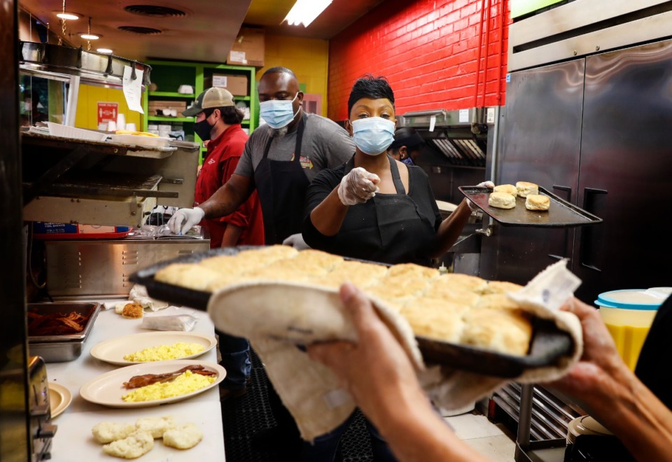 <strong>Bryant&rsquo;s employees wore masks as they prepared breakfast items at its reopening on April 14, 2021. Shelby County businesses will be back to enforcing masking under the new indoor mask mandate, which takes effect on Friday, Aug. 20.</strong> (Mark Weber/Daily Memphian file)