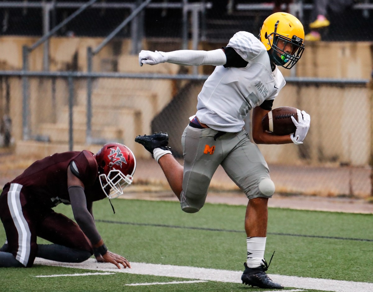 <strong>MAHS receiver Jalen Shelton (right) runs for a touchdown against MASE on Thursday, Aug. 19, 2021.</strong> (Mark Weber/The Daily Memphian)