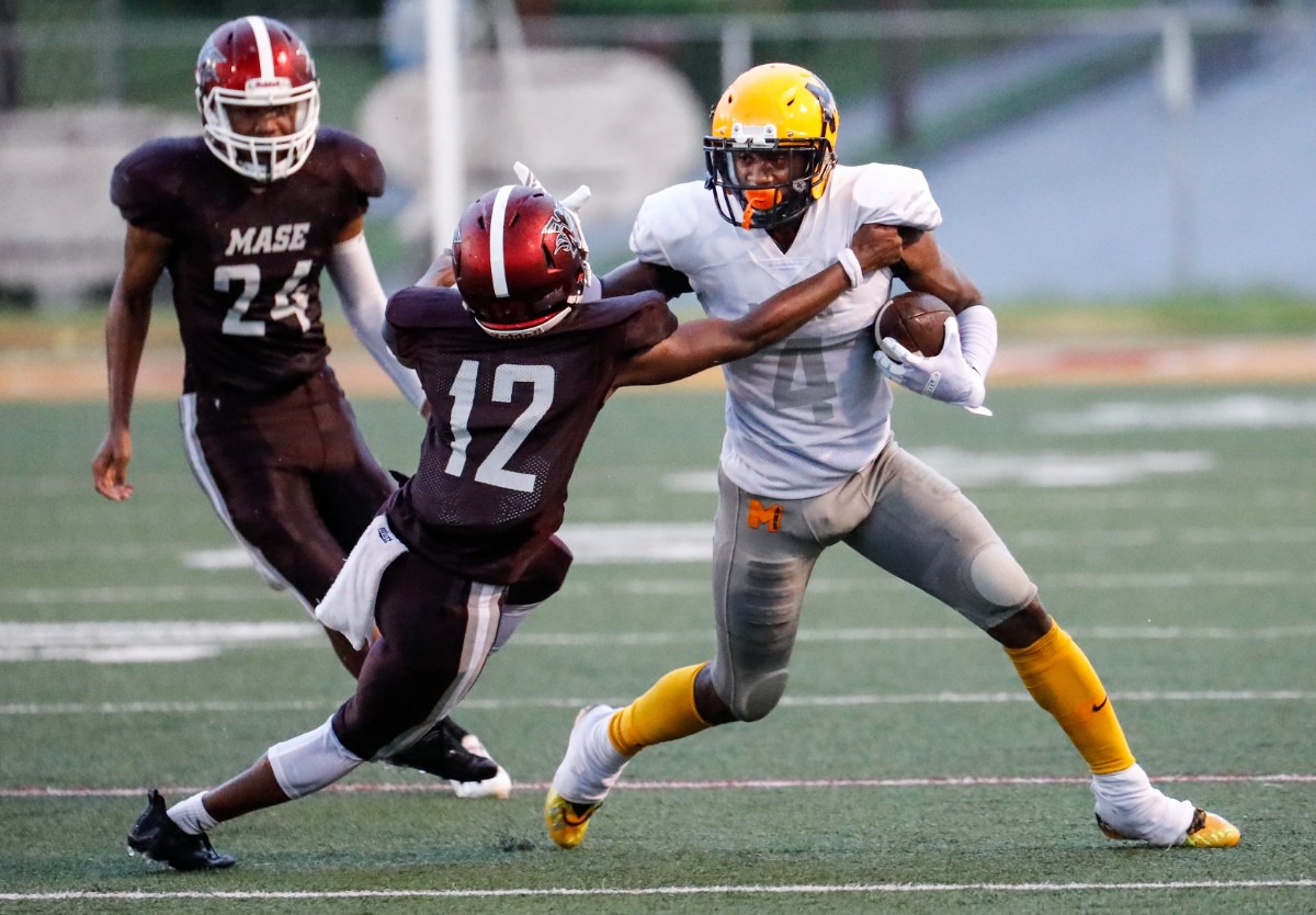 <strong>MAHS receiver Jalen Dale (right) fights off MASE&rsquo;s Keshion Walton (left) on Thursday, Aug. 19, 2021.</strong> (Mark Weber/The Daily Memphian)