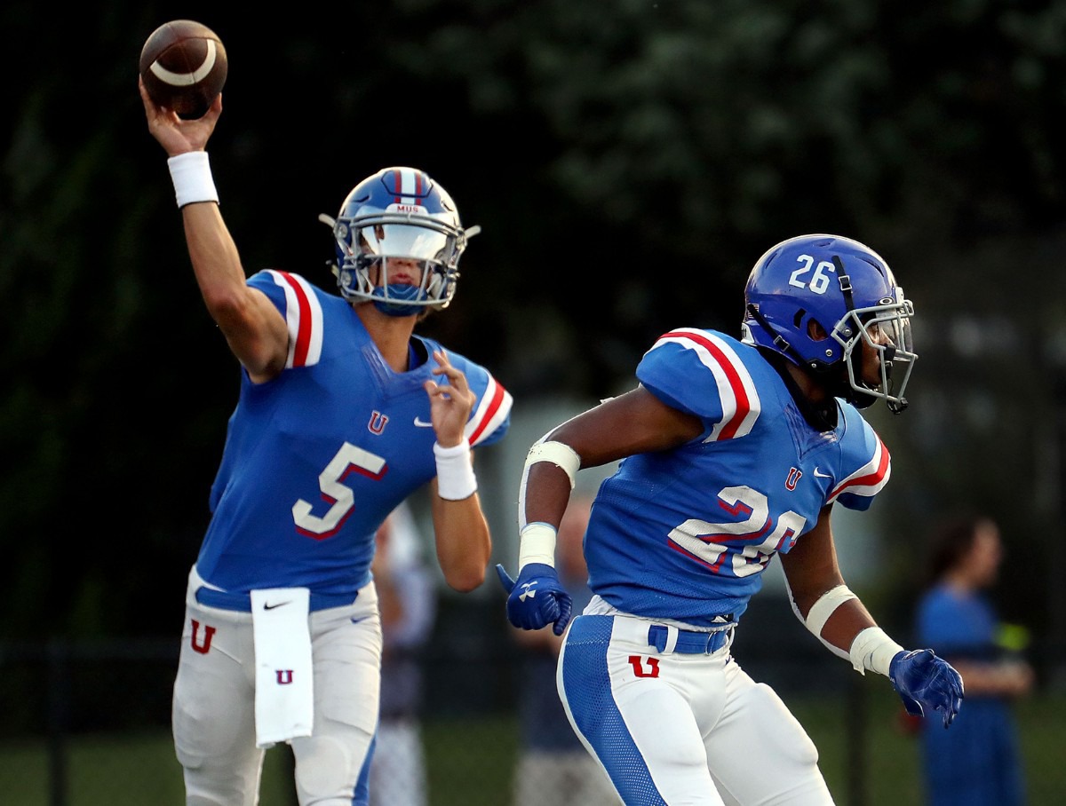 <strong>MUS quarterback George Hamsley (5) throws a pass against Arlington High School on Aug. 20, 2021.</strong> (Patrick Lantrip/Daily Memphian)