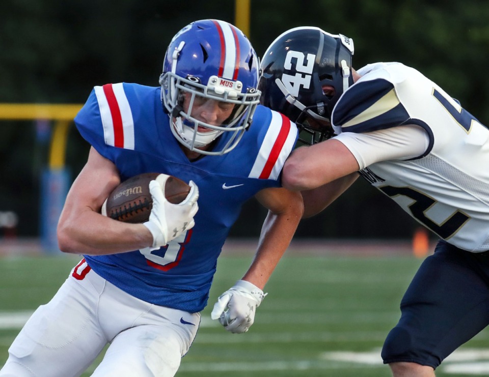 <strong>MUS wide receiver Mac Owen (3) takes a hit on Aug. 20, 2021, in the home opener against Arlington High School.</strong> (Patrick Lantrip/Daily Memphian)