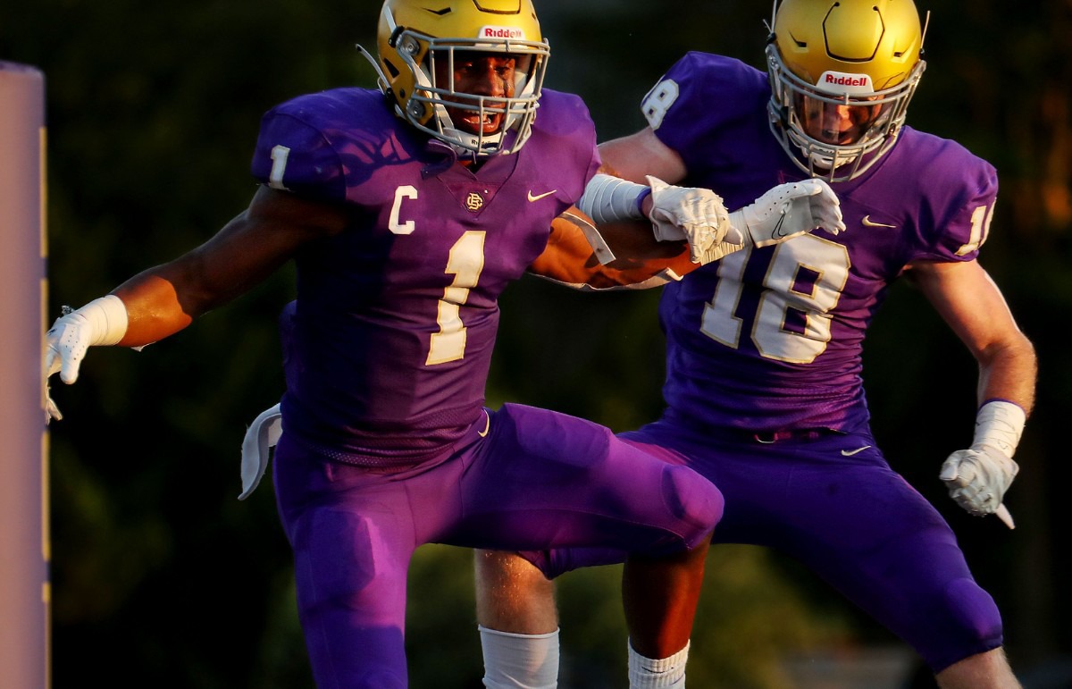 <strong>CBHS running back Dallan Hayden (1) celebrates with teammate Sam Wallace (18) after scoring a touchdown during an Aug. 21 game against Germantown.</strong> (Patrick Lantrip/Daily Memphian)