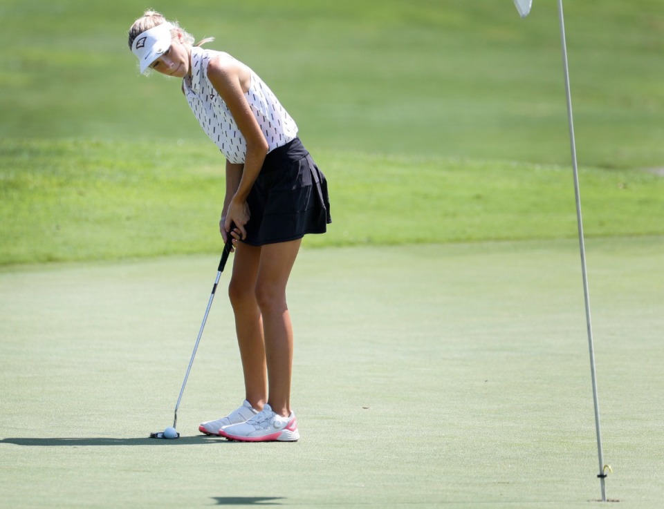 <strong>ECS golfer Claire Todd lines up her putt during the FCA Golf Tournament on Monday, Aug. 23, 2021 at Windyke Country Club.</strong> (Mark Weber/The Daily Memphian)