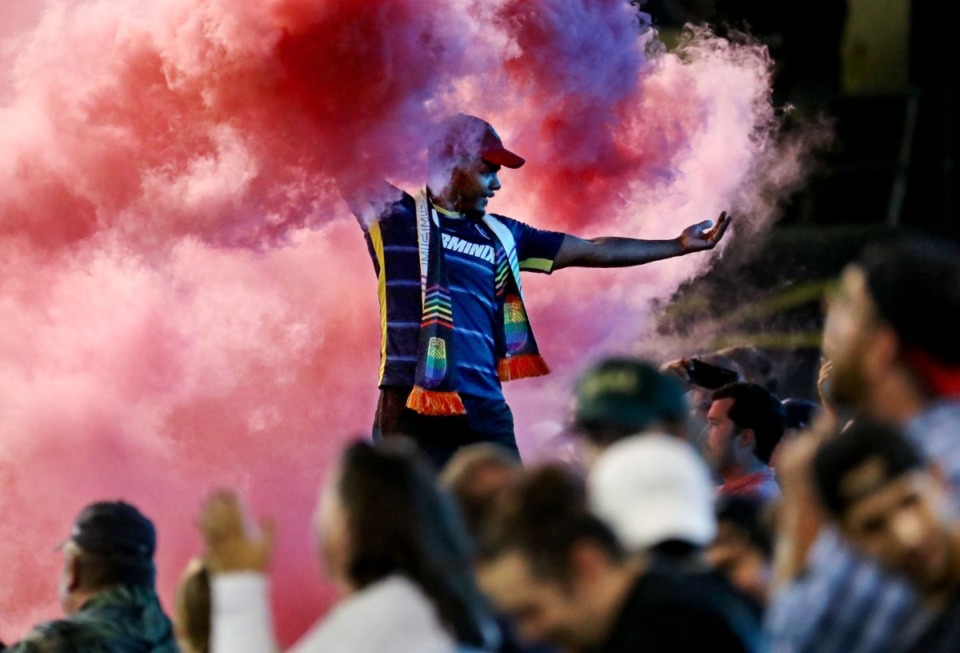 <strong>Memphis 901 FC fan Chris Smith hypes up the crowd after a goal against Colorado Springs on Aug. 10, at AutoZone Park.</strong> (Patrick Lantrip/Daily Memphian)