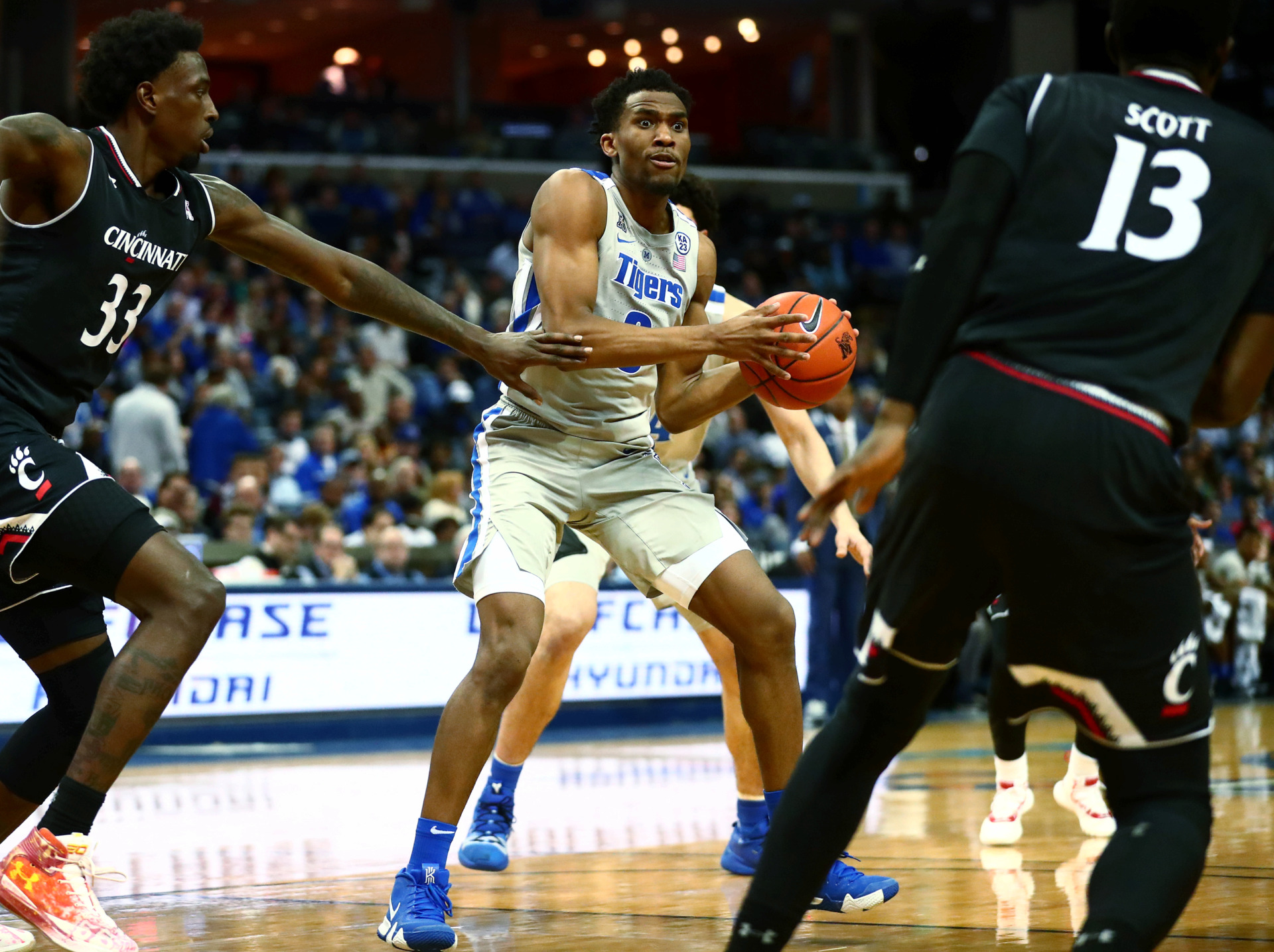 <strong>Memphis senior guard Jeremiah Martin (3) weaves through defenders during a game against the Cincinnati Bearcats on Thursday, Feb. 7, 2019, in Memphis. A strong performance from Martin wasn't enough to save the Tigers, who fell 69-64.</strong> (Houston Cofield/Daily Memphian)