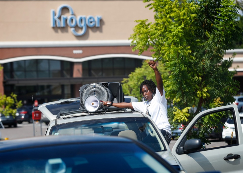 <strong>Activist Barbara Buress attends a rally for Alvin Motley Jr., at the East Memphis Kroger gas station on Thursday, Aug. 26, 2021 on Poplar near Kirby Parkway. Gregory Livingston, a security guard accused of shooting Motley at the Kroger gas station, is charged with second-degree murder.</strong> (Mark Weber/The Daily Memphian)