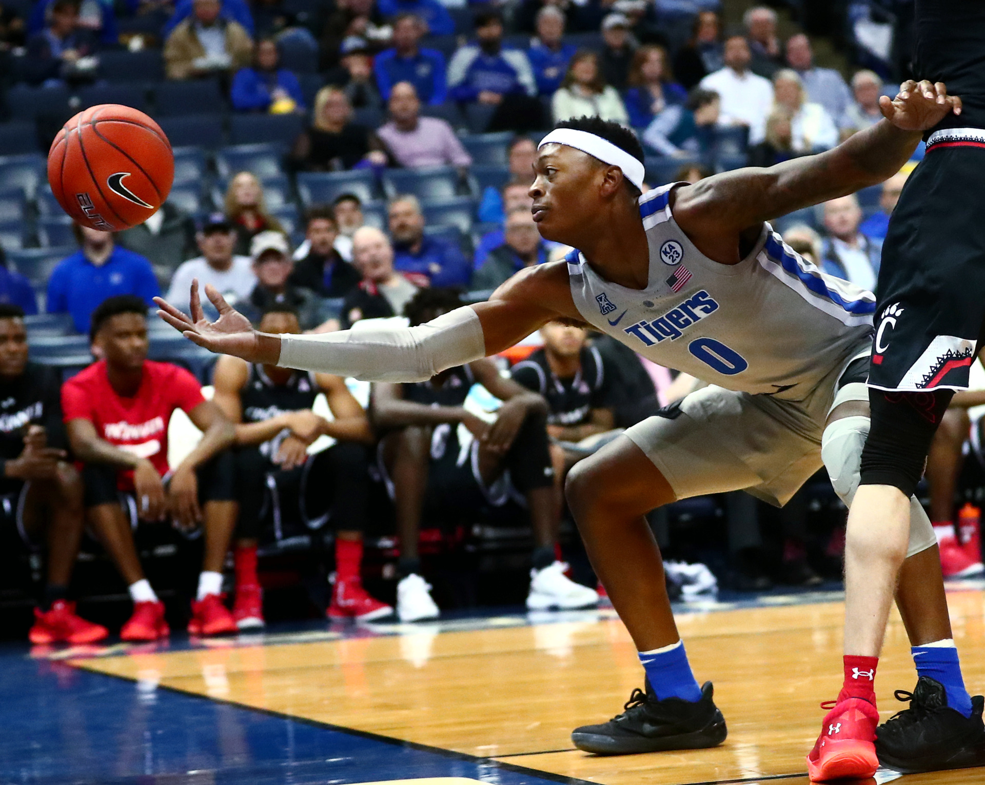 <strong>Memphis Tigers senior forward Kyvon Davenport (0) reaches for a ball going out of bounds during a game against the Cincinnati Bearcats on Thursday, Feb. 7, 2019. Davenport fouled out in the waning moments of the game.</strong>&nbsp;(Houston Cofield/Daily Memphian)
